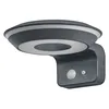A dark gray outdoor LED wall lamp with a circular light element, mounted on a white background. Produktbild-Vorschau