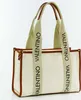 A studio shot of a Valentino tote bag. Anteprima dell’immagine prodotto