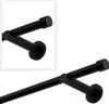 Close-up view of a black curtain rod with mounting hardware. Anteprima dell’immagine prodotto