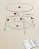 An assembly diagram for a small table with labeled parts. Produktbild-Vorschau