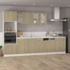 A modern kitchen with light wood cabinets and stainless steel appliances. Anteprima dell’immagine prodotto