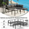 An outdoor seating group with a sectional sofa and coffee tables on a patio with a body of water in the background. Produktbild-Vorschau