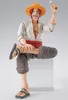 A figure of a character from the anime One Piece, sitting and holding an ice cream scoop. Náhled obrázku produktu