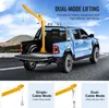 A blue pickup truck with a yellow crane mounted in the bed, parked on a road with a mountainous background. Below are three smaller images illustrating different lifting modes of the crane. Anteprima dell’immagine prodotto