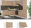 A modern kitchen with wooden cabinets and a black marble backsplash. Náhled obrázku produktu