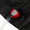 A close-up view of a black solar camping shower with a red valve and a white tube attached. Náhled obrázku produktu