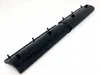 A black plastic cleaning attachment with several small protrusions along its length, shown against a white background. Náhľad obrázku produktu