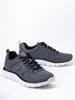 A pair of men's athletic shoes on a white background. Produktbild-Vorschau