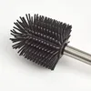 Close-up of a toilet brush head and part of the handle. Anteprima dell’immagine prodotto