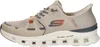 A side view of a single beige Skechers Glide Step Slip In sports shoe. Voir les images du produit