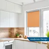 A modern kitchen with white cabinets, a wooden backsplash, and a window with an orange roller blind. Produktbild-Vorschau