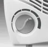 Close-up of a white fan's control knob and grille. Anteprima dell’immagine prodotto
