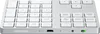 A close-up, top-down view of a silver and white extended wireless keypad. Náhled obrázku produktu