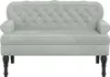 A light gray velvet sofa with tufted backrest and black legs, shown from the front against a white background. Náhled obrázku produktu