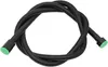 A black flexible hose with green caps on both ends, coiled on a white background. Podgląd zdjęcia produktu