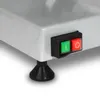 A close-up view of the base of a silver appliance, showing a black foot and a black switch panel with a green 'I' button and a red 'O' button. Produktbild-Vorschau