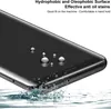 A close-up of a smartphone screen with water droplets on it, and water splashing around the bottom edge. Anteprima dell’immagine prodotto