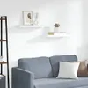 A living room scene with a sofa and shelves. Anteprima dell’immagine prodotto