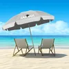 Two beach chairs and a beach umbrella on a sandy beach with the ocean and sky in the background. Náhled obrázku produktu
