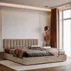 A bedroom scene with a bed and headboard. Podgląd zdjęcia produktu