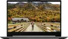 A laptop displaying a scenic image of a house and a person walking on a bridge in a forest during autumn. Produktbild-Vorschau