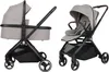 A side-by-side comparison of a stroller in bassinet mode and in seat mode. Produktbild-Vorschau