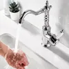 A hand is being washed under a running faucet in a sink. Produktbild-Vorschau