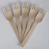 A group of wooden forks arranged in a fan shape on a white background. Produktbild-Vorschau
