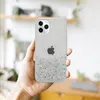 A hand holds an iPhone 11 with a glittery transparent case. Náhľad obrázku produktu