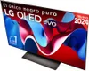 A close-up, angled view of an LG OLED evo television displaying a colorful, abstract graphic. The screen has marketing text and logos. Produktbild-Vorschau