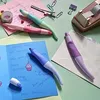 Stationery items including pens, tape dispenser, paper clips, and a greeting card. Anteprima dell’immagine prodotto