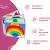 A soft fabric book for babies with colorful illustrations of a rainbow, sun, and ladybug, presented with feature callouts. Produktbild-Vorschau