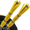 Close-up of two yellow cables with metal clamps. Produktbild-Vorschau