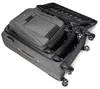 An open suitcase with another smaller suitcase inside, showing the interior and wheels. Náhled obrázku produktu
