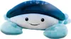 A plush toy crab with a dark blue shell that projects stars. Náhled obrázku produktu