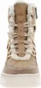 A close-up, front-facing view of a tan winter boot with white faux fur trim and beige laces. Produktbild-Vorschau