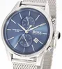A close-up shot of a Hugo Boss watch with a blue dial and silver mesh strap. Produktbild-Vorschau