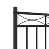 Close-up of a black metal bed frame with decorative scrollwork. Produktbild-Vorschau
