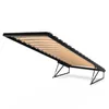 A bed frame with wooden slats and a black metal frame, shown at an angle on a white background. Náhled obrázku produktu