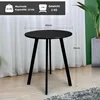 A black round side table with three legs is shown in a room with white curtains in the background and a plant in a pot on the right. Dimensions are indicated. Produktbild-Vorschau