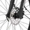 A close-up view of a bicycle's front wheel and disc brake system, attached to a black suspension fork. Produktbild-Vorschau