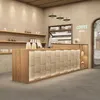 Interior of a modern coffee shop with a prominent wooden counter and shelves. Produktbild-Vorschau