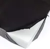 A close-up view of a dog mattress with a partially unzipped cover revealing the white foam interior. Produktbild-Vorschau