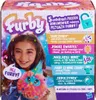 A young girl holding a Furby toy, with the product packaging in the background. Podgląd zdjęcia produktu