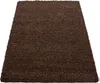 A brown shaggy rug is shown from a slightly elevated angle against a white background. Anteprima dell’immagine prodotto