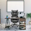An office chair and desk setup in a modern office. Produktbild-Vorschau