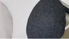 A close-up view of a pillow with a two-tone design. Produktbild-Vorschau