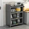 A gray kitchen cabinet with glass doors filled with kitchenware, placed next to a microwave and other kitchen appliances. Anteprima dell’immagine prodotto