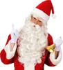 A man dressed as Santa Claus, wearing a red suit and hat, white gloves, and a white beard and wig, is holding a golden bell in his right hand and has his left index finger raised. Anteprima dell’immagine prodotto