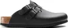 A black Birkenstock clog shoe is shown from the side against a white background. Produktbild-Vorschau